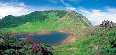 Mt. Hallasan rising in the middle of Jejudo has a crater lake.