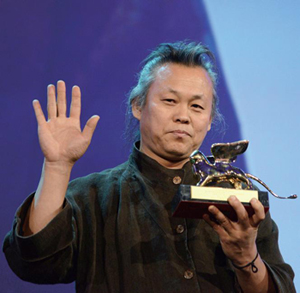 Korean movie director Kim Ki-duk holds the Golden Lion Award for the movie ‘Pieta’, during the closing award ceremony of the 69th Venice International Film Festival in Venice, Italy, 08 September 2012.